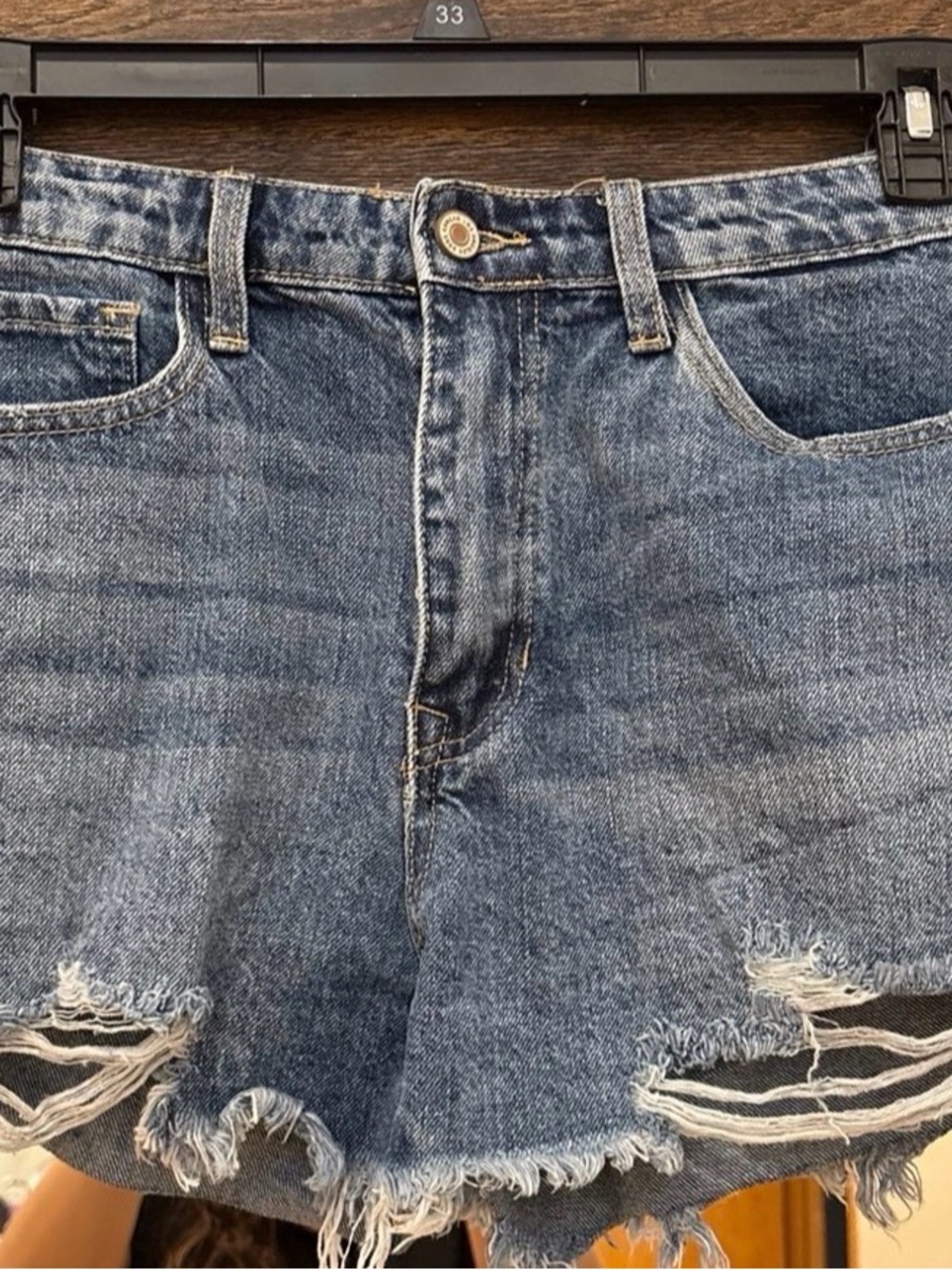 KanCan Medium Blue Denim Shorts with Frayed Hem